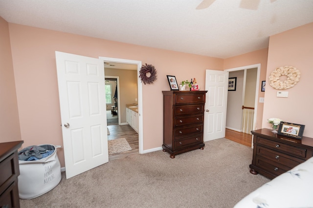 477 Cresthaven, Boiling Springs, SC 29316 - bedroom with light colored carpet, baseboards, a ceiling fan, and connected bathroom