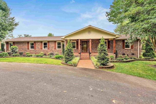 268 Margate, Chesnee, SC 29323 - ranch-style house with a porch, brick siding, and a front yard