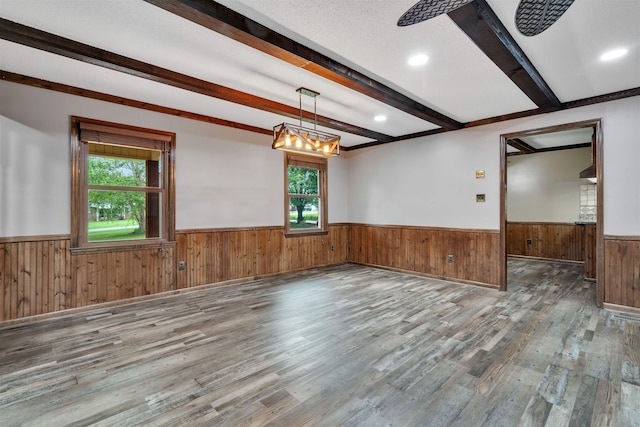 268 Margate, Chesnee, SC 29323 - spare room featuring wainscoting, wood finished floors, plenty of natural light, beam ceiling, and wood walls