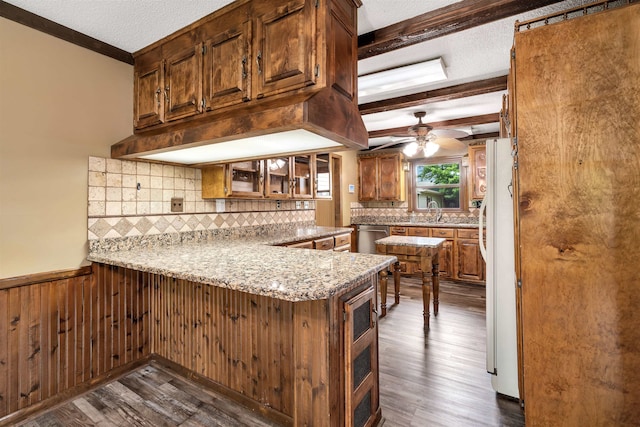 268 Margate, Chesnee, SC 29323 - kitchen with ceiling fan, dark wood-type flooring, a peninsula, a textured ceiling, and dishwasher