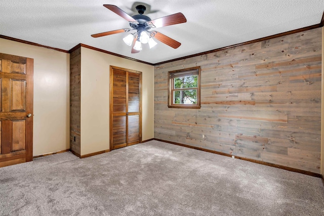 268 Margate, Chesnee, SC 29323 - unfurnished bedroom with carpet, a closet, crown molding, a textured ceiling, and baseboards