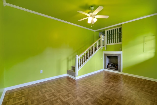 268 Margate, Chesnee, SC 29323 - unfurnished living room with ceiling fan, stairway, a tile fireplace, baseboards, and crown molding