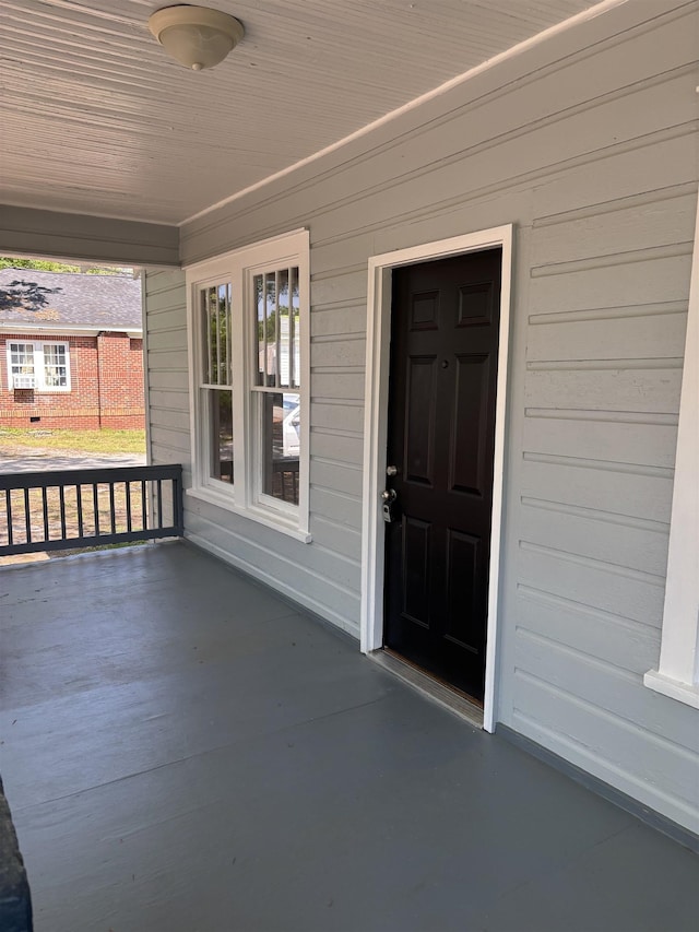 112 Scruggs, Spartanburg, SC 29303 - view of exterior entry featuring a porch