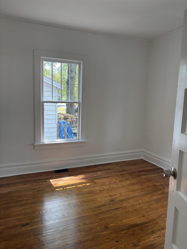 112 Scruggs, Spartanburg, SC 29303 - spare room featuring dark wood-type flooring