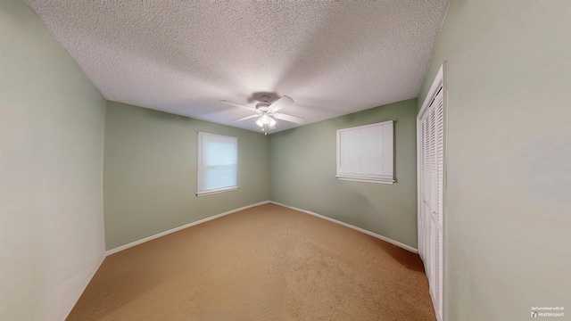 181 Peach, Inman, SC 29349 - unfurnished room featuring a ceiling fan, carpet flooring, and a textured ceiling
