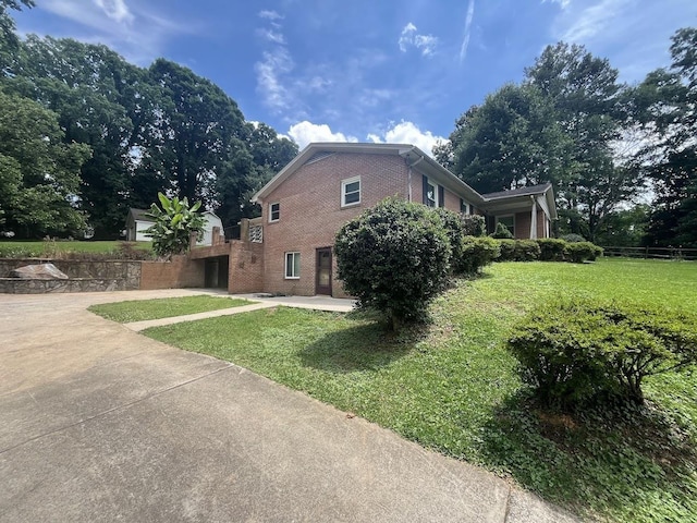 119 Hillside Dr, Gaffney, SC 29340 - view of side of home featuring brick siding and a lawn
