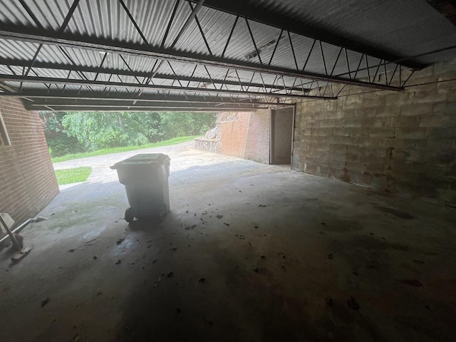 119 Hillside Dr, Gaffney, SC 29340 - garage featuring concrete block wall