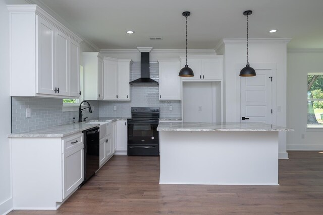 103 Cedar Fls, Fountain Inn, SC 29644 - kitchen featuring black appliances, wall chimney range hood, tasteful backsplash, a center island, and ornamental molding