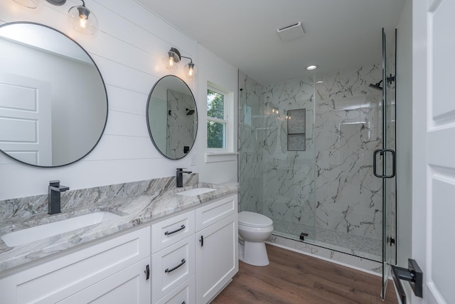 103 Cedar Fls, Fountain Inn, SC 29644 - full bath with a marble finish shower, wood finished floors, double vanity, and recessed lighting