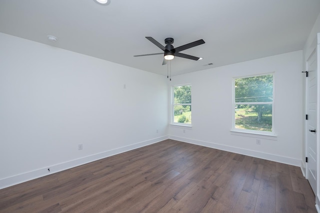 103 Cedar Fls, Fountain Inn, SC 29644 - spare room with dark wood-type flooring, ceiling fan, and a smoke detector