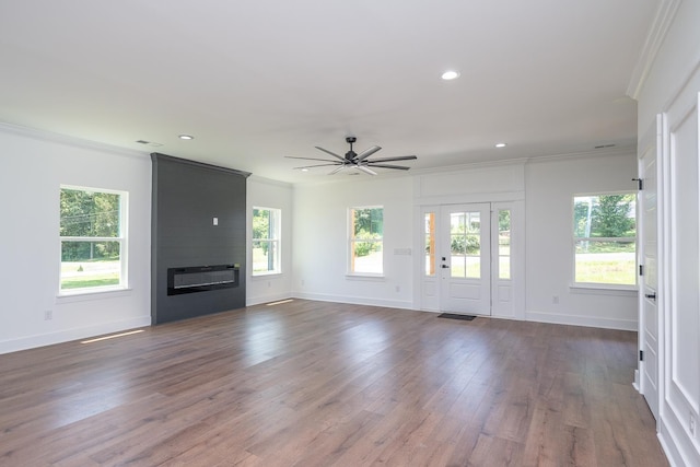 103 Cedar Fls, Fountain Inn, SC 29644 - unfurnished living room featuring ceiling fan, dark wood finished floors, ornamental molding, a fireplace, and recessed lighting