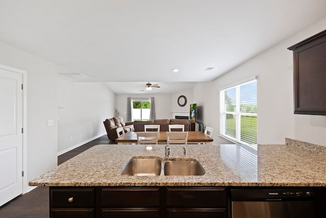 259 Millen, Woodruff, SC 29388 - kitchen with stainless steel dishwasher, dark wood-type flooring, a ceiling fan, and dark brown cabinetry