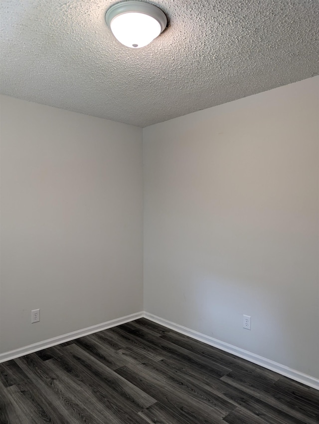 126 Loblolly, Wellford, SC 29385 - unfurnished room featuring dark wood-style floors and a textured ceiling