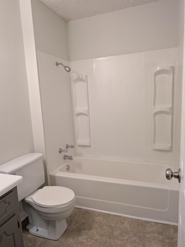 126 Loblolly, Wellford, SC 29385 - bathroom with vanity, shower / bathtub combination, and a textured ceiling