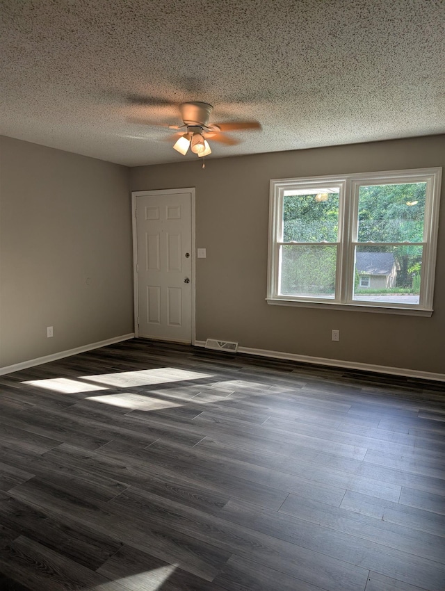 126 Loblolly, Wellford, SC 29385 - empty room featuring dark wood-style flooring, a ceiling fan, and a textured ceiling