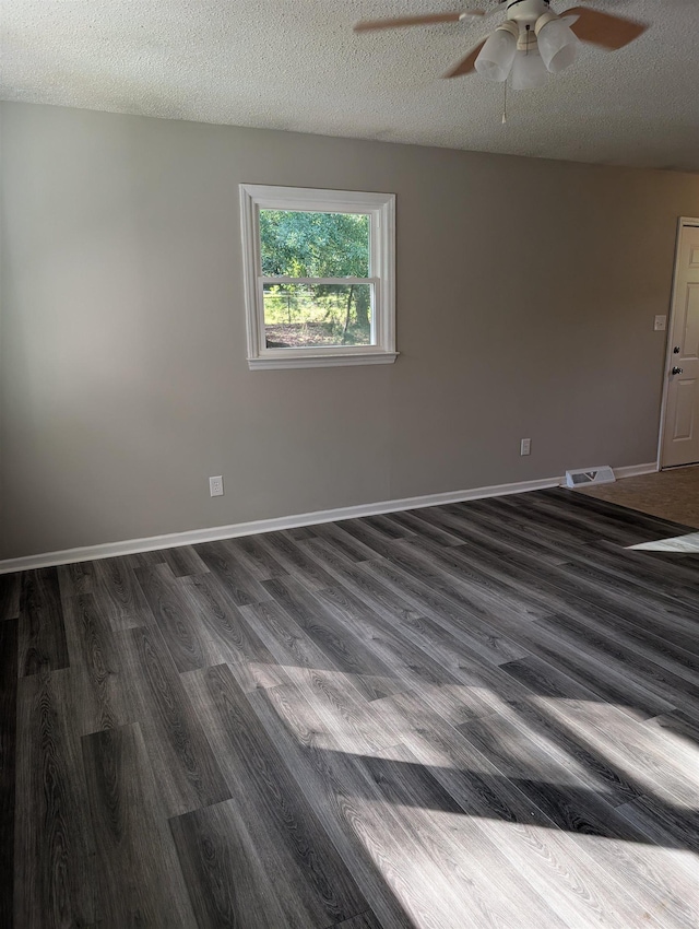 126 Loblolly, Wellford, SC 29385 - unfurnished room featuring ceiling fan, dark wood-style flooring, and a textured ceiling