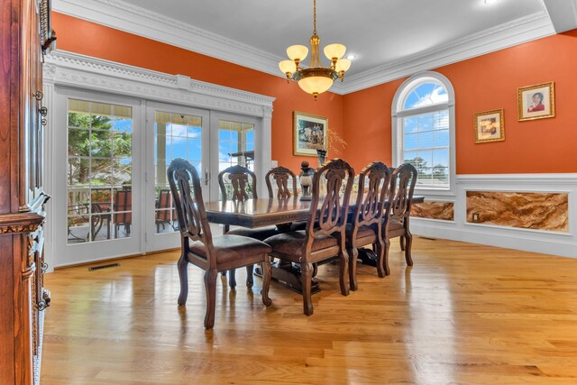 410 Anchorage, Inman, SC 29349 - dining room featuring crown molding, a chandelier, and light wood-type flooring