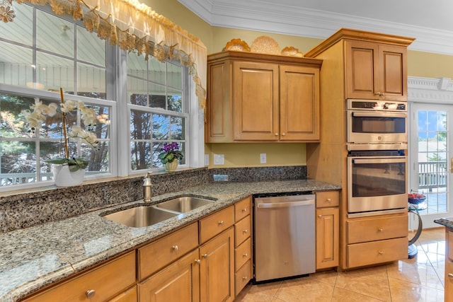 410 Anchorage, Inman, SC 29349 - kitchen featuring appliances with stainless steel finishes, crown molding, stone counters, light tile patterned floors, and brown cabinetry