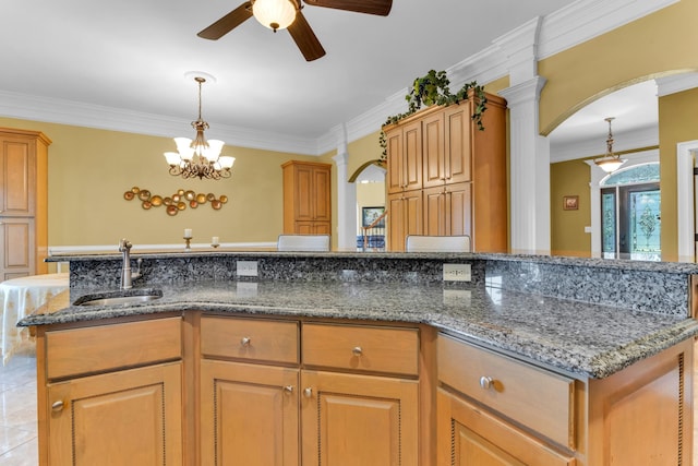410 Anchorage, Inman, SC 29349 - kitchen with crown molding, ceiling fan, arched walkways, decorative light fixtures, and stone countertops
