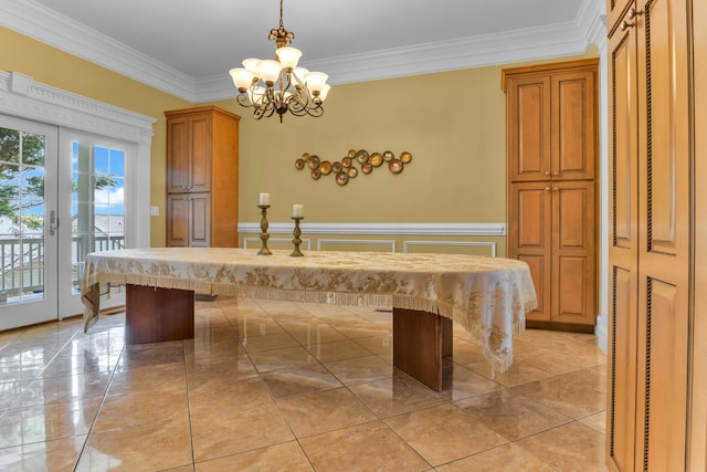 410 Anchorage, Inman, SC 29349 - dining space featuring a chandelier, crown molding, a decorative wall, a wainscoted wall, and french doors