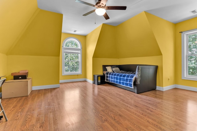 410 Anchorage, Inman, SC 29349 - unfurnished bedroom with multiple windows, wood finished floors, ceiling fan, and lofted ceiling