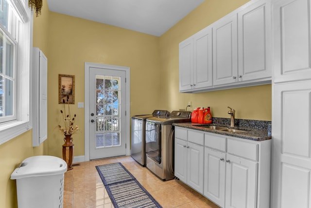 410 Anchorage, Inman, SC 29349 - laundry area featuring cabinet space, washing machine and dryer, and light tile patterned flooring