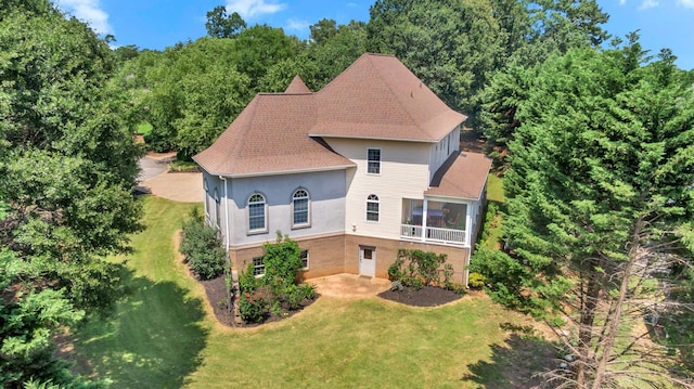 410 Anchorage, Inman, SC 29349 - view of front of property with a sunroom, a front yard, and roof with shingles