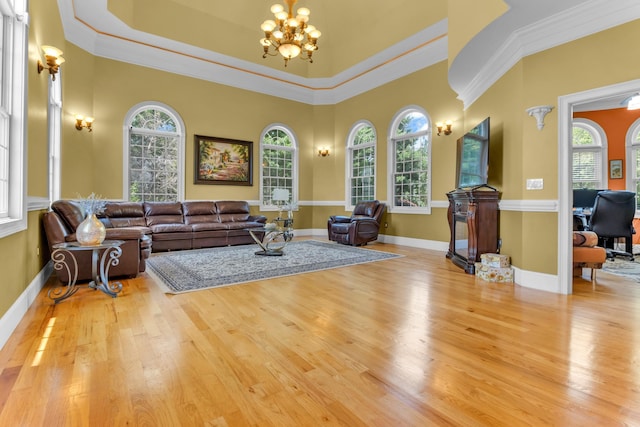 410 Anchorage, Inman, SC 29349 - living room with a chandelier, wood finished floors, and crown molding
