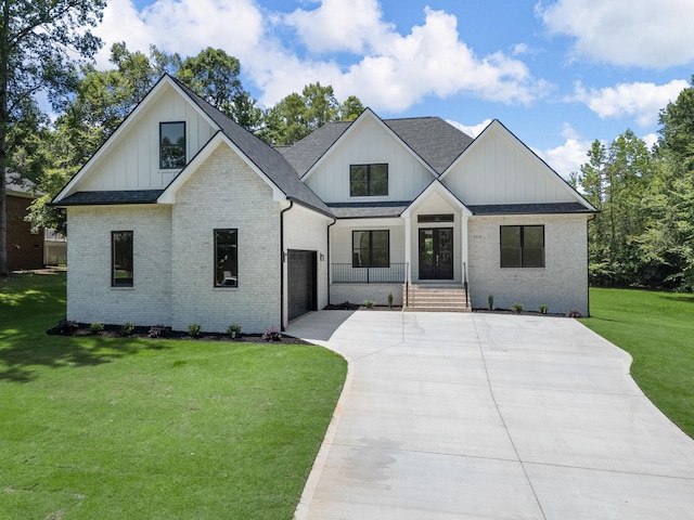 162 Clearcreek, Boiling Springs, SC 29316 - modern farmhouse with driveway, a front lawn, brick siding, a garage, and a shingled roof