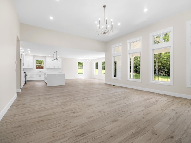 162 Clearcreek, Boiling Springs, SC 29316 - unfurnished living room featuring a chandelier, recessed lighting, and light wood finished floors