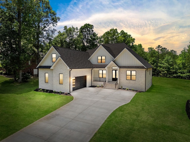 162 Clearcreek, Boiling Springs, SC 29316 - modern farmhouse featuring concrete driveway, a garage, a front yard, and roof with shingles