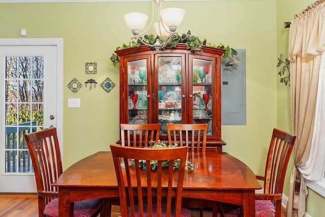 387 Goodview, Hendersonville, NC 28792 - dining area with a chandelier, electric panel, and wood finished floors
