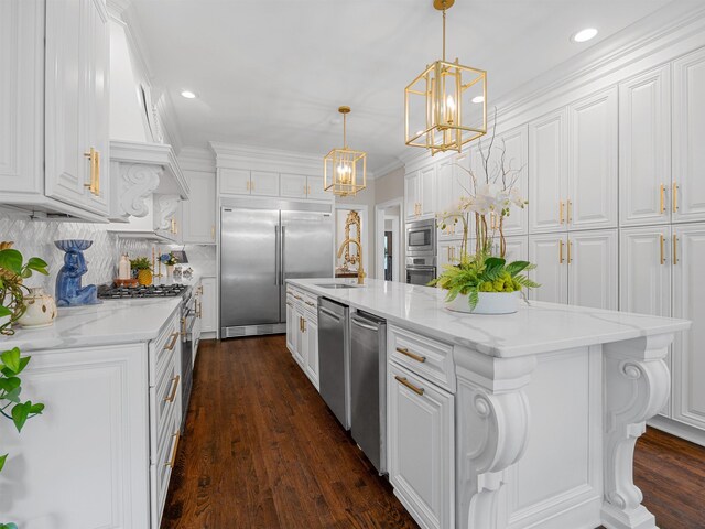504 Carolina Clb, Spartanburg, SC 29306 - kitchen featuring built in appliances, white cabinets, a chandelier, recessed lighting, and ornamental molding