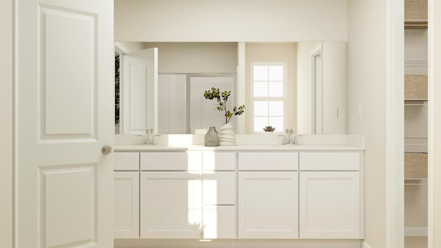 1079 Cleveland Mdws, Spartanburg, SC 29303 - bathroom with double vanity and a walk in closet