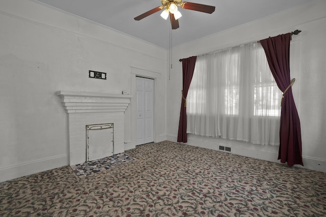 283 Hydrick, Spartanburg, SC 29306 - spare room featuring ceiling fan and a brick fireplace