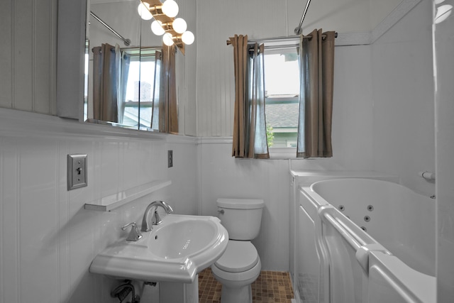 283 Hydrick, Spartanburg, SC 29306 - bathroom featuring a tub with jets and healthy amount of natural light