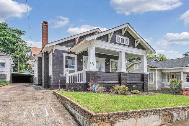 283 Hydrick, Spartanburg, SC 29306 - craftsman-style house with a porch, a front lawn, and a chimney