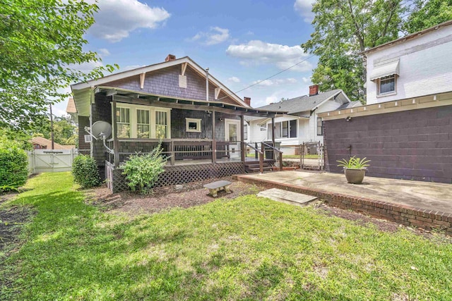 283 Hydrick, Spartanburg, SC 29306 - rear view of house with a gate, a patio area, and a chimney