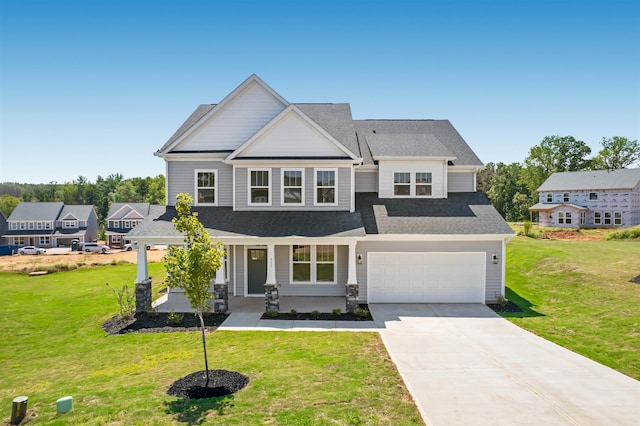 913 Wild Pne, Duncan, SC 29334 - craftsman-style home featuring a porch, driveway, a front lawn, a garage, and a shingled roof