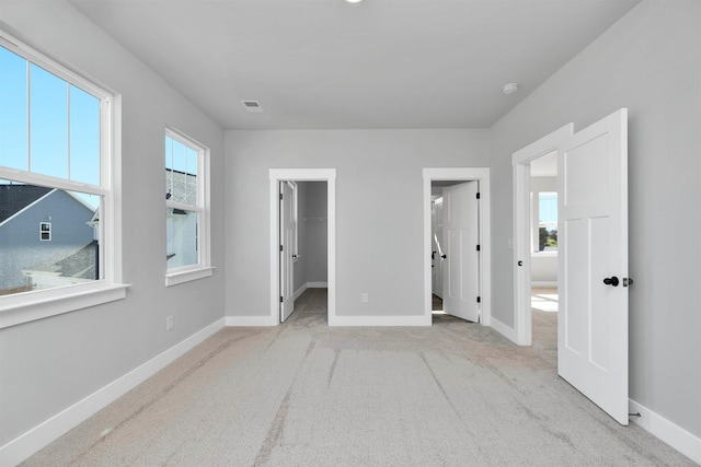 913 Wild Pne, Duncan, SC 29334 - unfurnished bedroom with carpet and a spacious closet