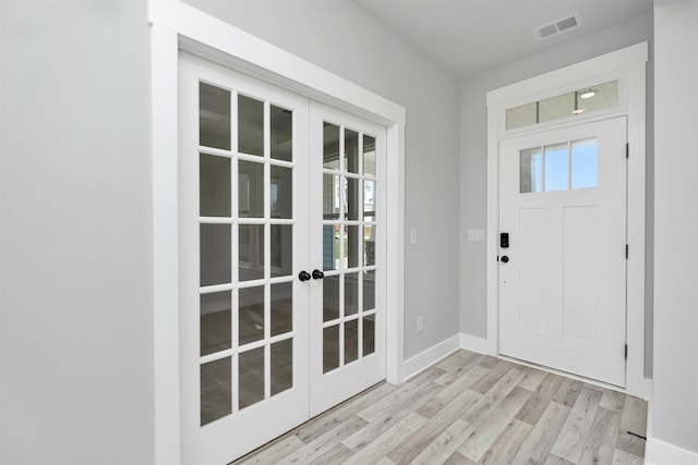 913 Wild Pne, Duncan, SC 29334 - entrance foyer with french doors and light wood-style flooring