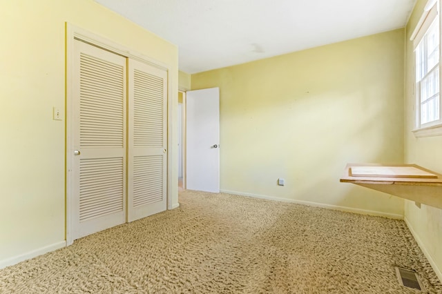 207 Oakmont Dr, Spartanburg, SC 29316 - unfurnished bedroom featuring carpet and a closet