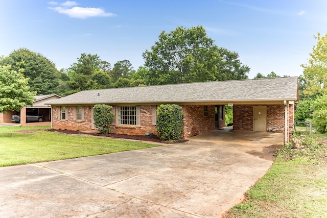 207 Oakmont Dr, Spartanburg, SC 29316 - ranch-style house featuring driveway, brick siding, a front yard, and an attached carport