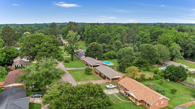 207 Oakmont Dr, Spartanburg, SC 29316 - aerial view of property and surrounding area with a heavily wooded area