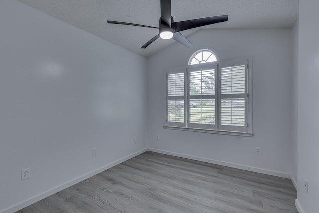 409 Cresthaven, Boiling Springs, SC 29316 - spare room featuring a textured ceiling, ceiling fan, wood finished floors, and lofted ceiling