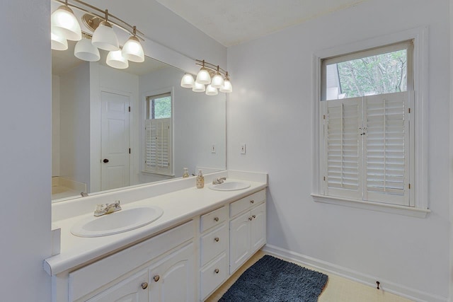 409 Cresthaven, Boiling Springs, SC 29316 - full bath featuring double vanity and baseboards