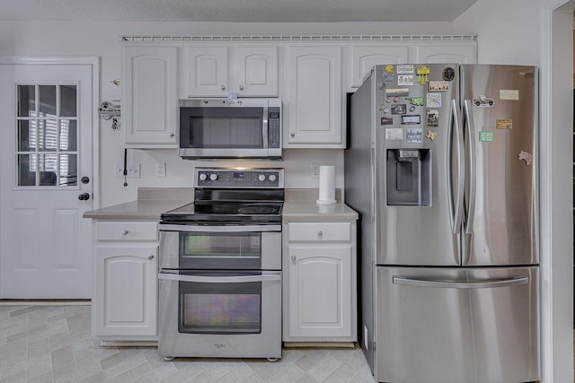 409 Cresthaven, Boiling Springs, SC 29316 - kitchen with appliances with stainless steel finishes, white cabinetry, and light countertops