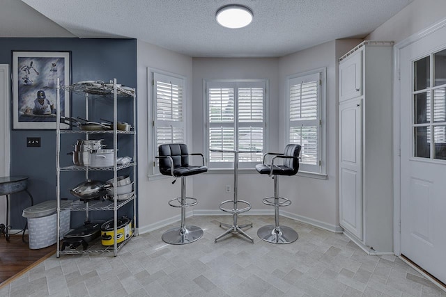 409 Cresthaven, Boiling Springs, SC 29316 - dining space featuring a textured ceiling and baseboards