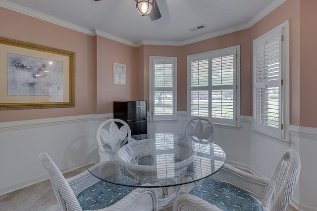 409 Cresthaven, Boiling Springs, SC 29316 - dining space with a ceiling fan, crown molding, and stone finish flooring