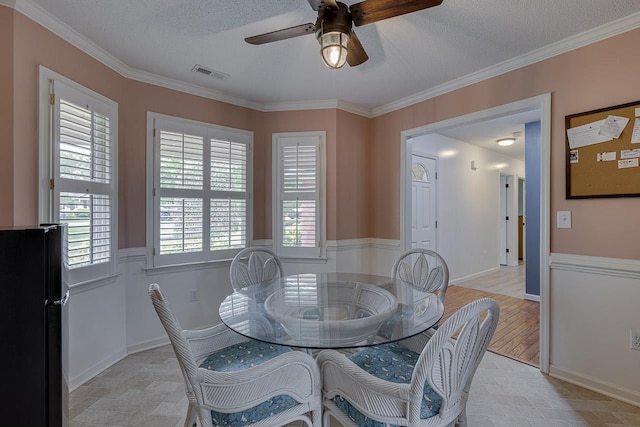 409 Cresthaven, Boiling Springs, SC 29316 - dining space featuring a ceiling fan, crown molding, and a textured ceiling